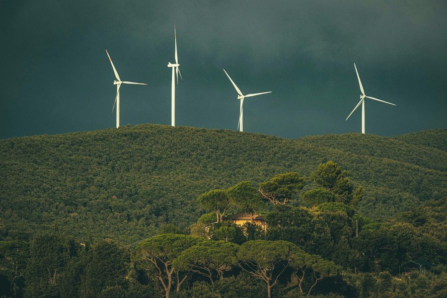 Utility-scale wind turbines on a hillside